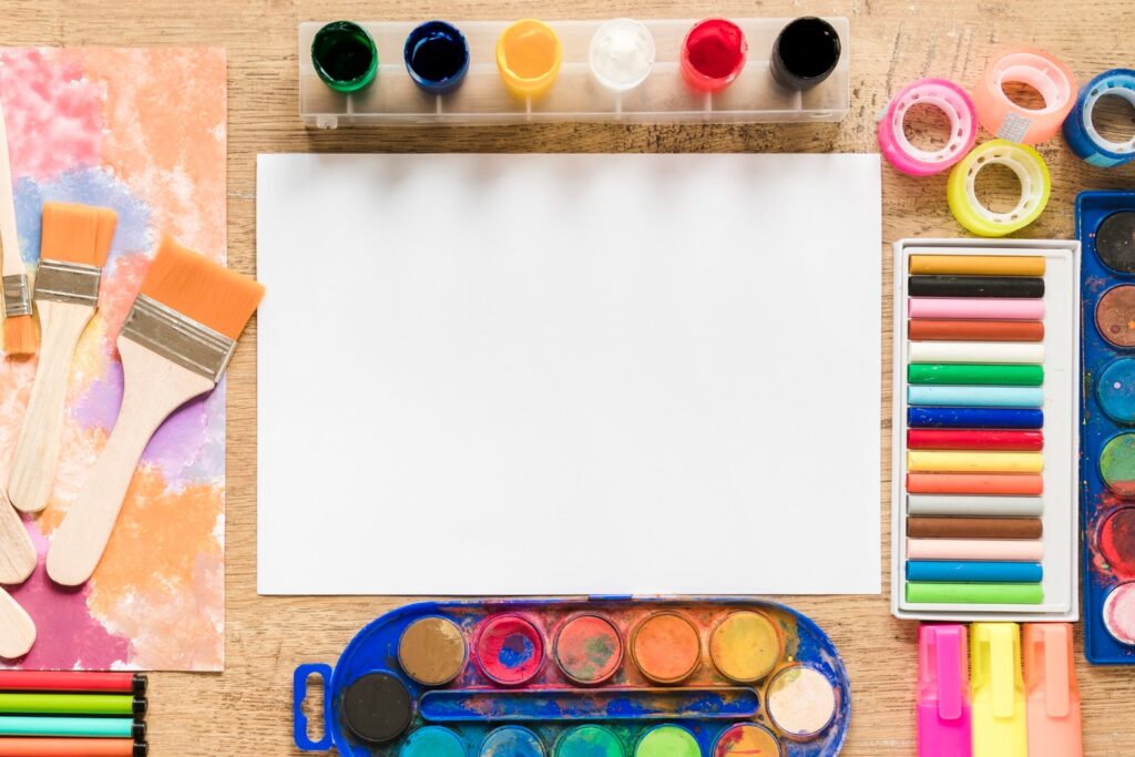 A colorful art and craft birthday party setup with kids engaging in creative activities.