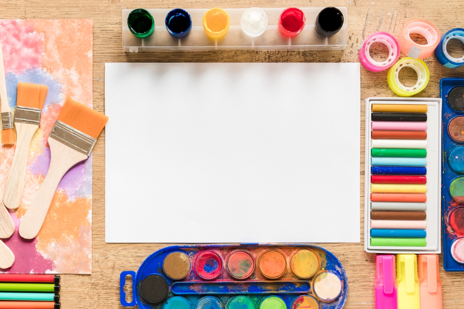 A colorful art and craft birthday party setup with kids engaging in creative activities.