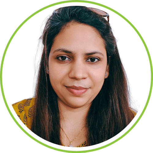 Artist Rajni Dutta creating a vibrant folk art piece, blending traditional techniques with contemporary design at Rajni Dutta Art.